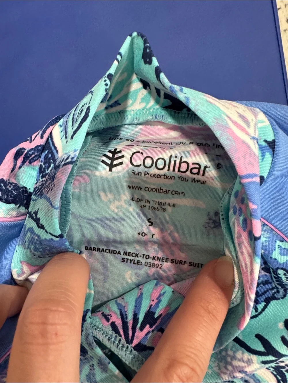 Coolibar toddler girl neck to knee Blue Seashell Print Zip-Front swimwuit